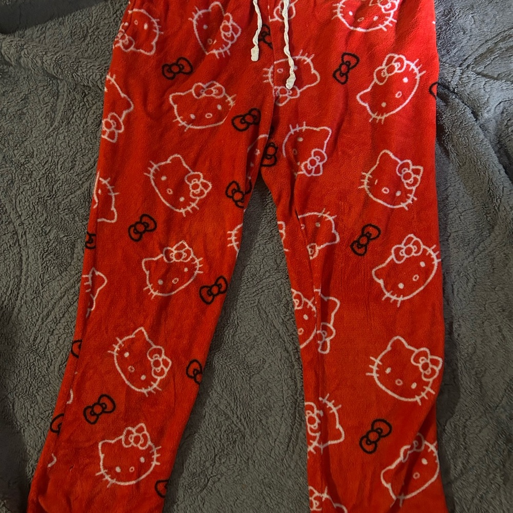 Hello Kitty-Red Fluffy Pajama Bottoms with Bow and Logo Prints.